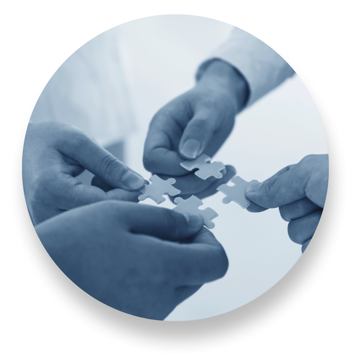 Four-Hands-Holding-Puzzle-Pieces